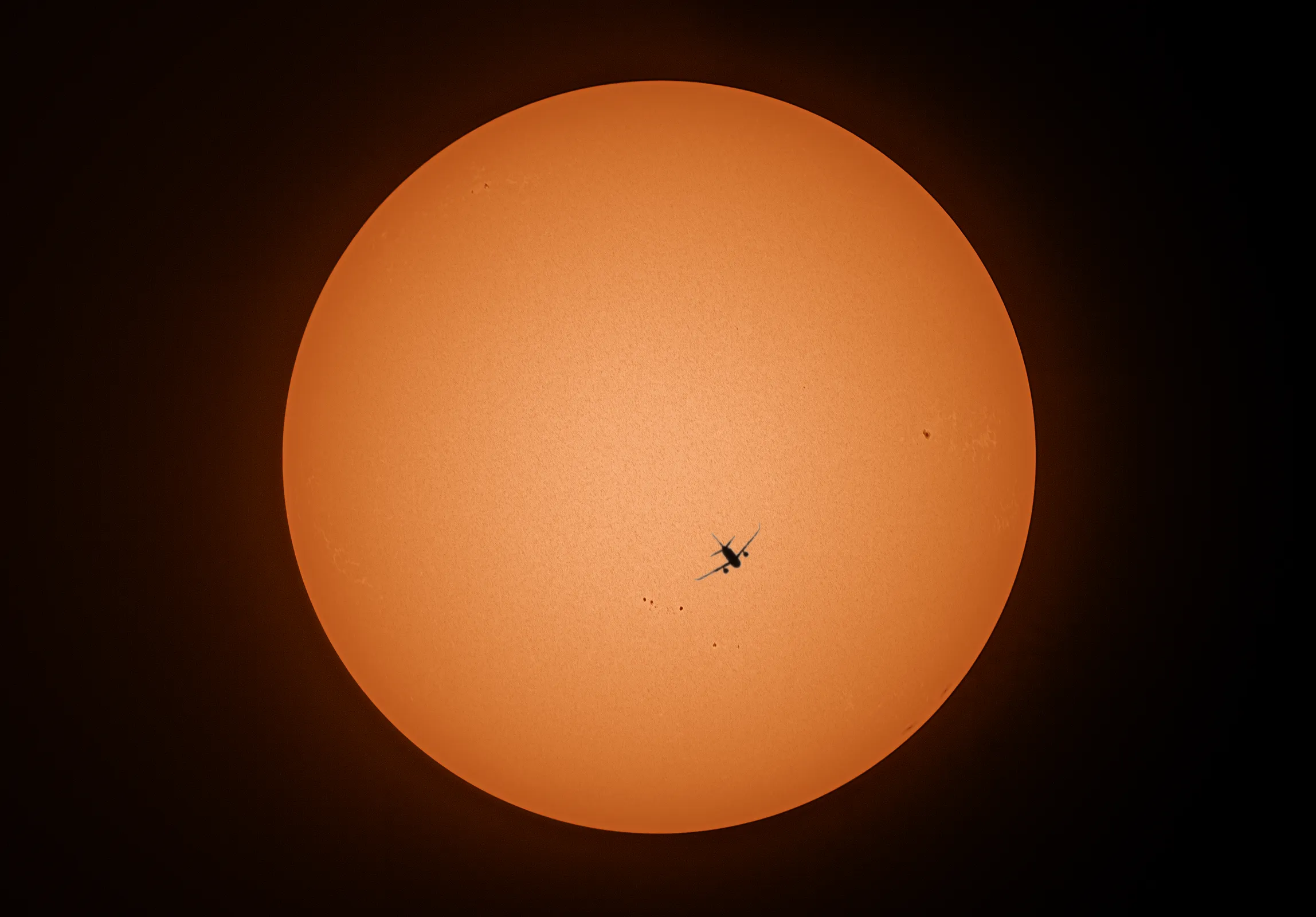 The Sun with a plane